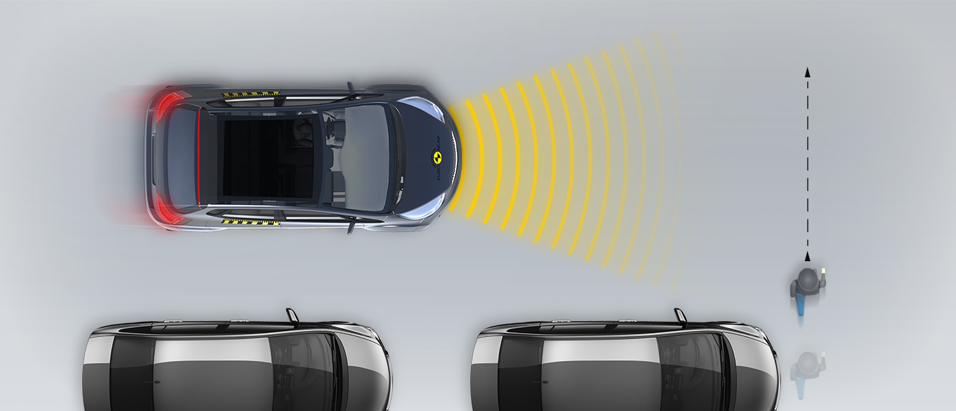 Child running from behind parked vehicles