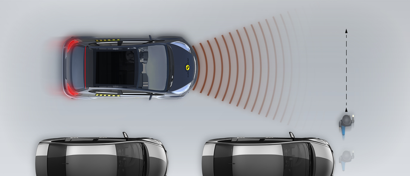 Child running from behind parked vehicles